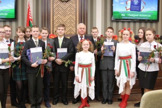 First Deputy Chairman of the State Control Committee Ivan Romanovich presented first national passports to the best teenagers of Minsk and Minsk region