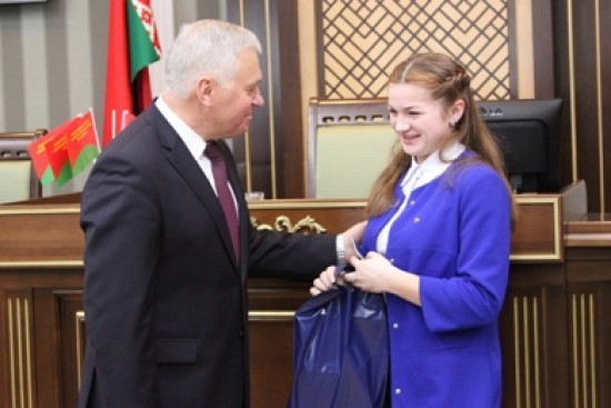 First Deputy Chairman of the State Control Committee Ivan Romanovich 
presented first national passports to the best teenagers of Minsk and 
Minsk region
